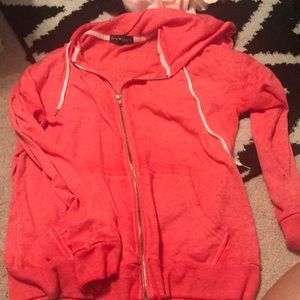 orange zip up jacket